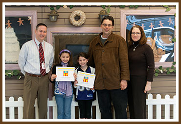 O'Hara Principal Dr. Michael Rowe, Griffin, Annie, and Tom & Jen Straw