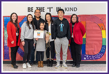 Clara with (L to R) Principal Batis, sister Audrey, father John, mother Susan, brother Isaac, and counselor Mrs Squeglia