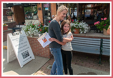 Lydia gets a hug from ABC owner Kathy Marsico!