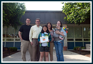 Ella with parents Mike and Jill and Tom, Jen, and Natalia Straw