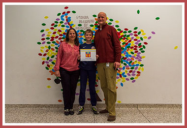 Tucker with proud parents Laurel & Luke
