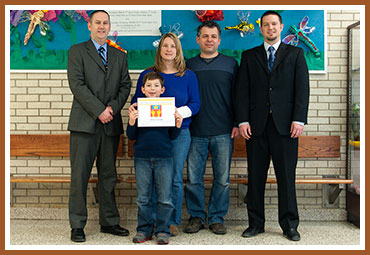 (L to R:) Principal Mike Rowe, Altai, Miranda, Mustafa, & Assistant Principal Rae.