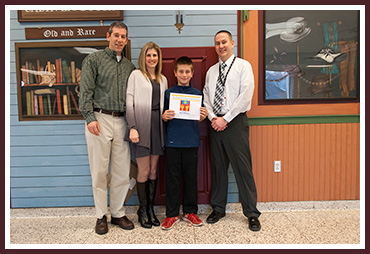 (L to R:) Gary, Christine, and Sam Morton, and O'Hara Principal Dr. Mike Rowe